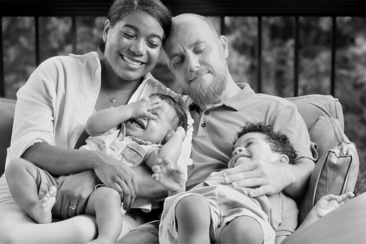 Jas with her husband and their two little boys